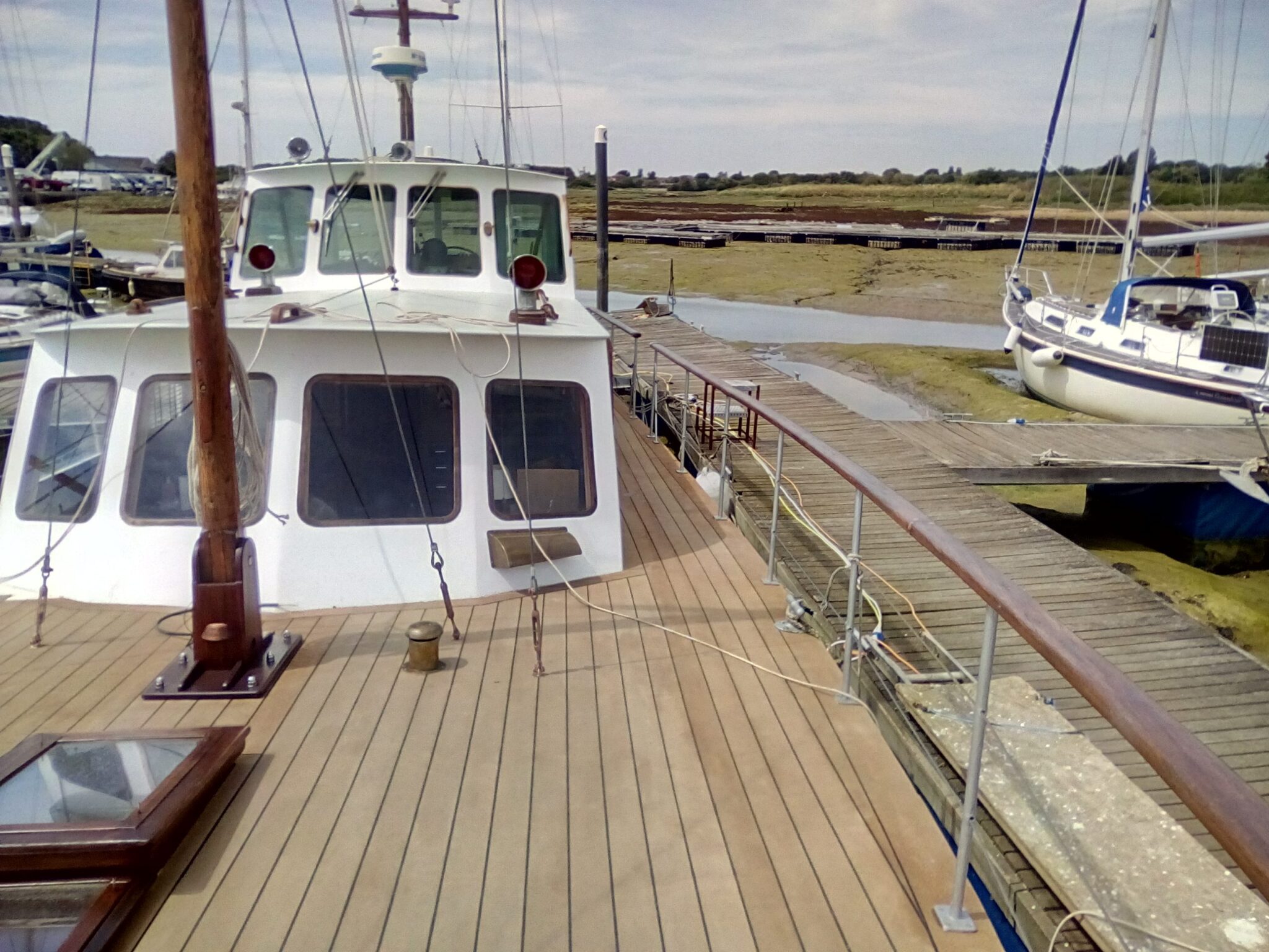 Steel boat with composite cork deck